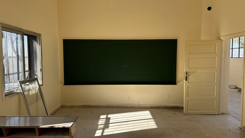 Sunlight across a restored classroom floor