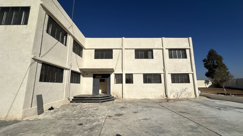 The restored two-storey school facade